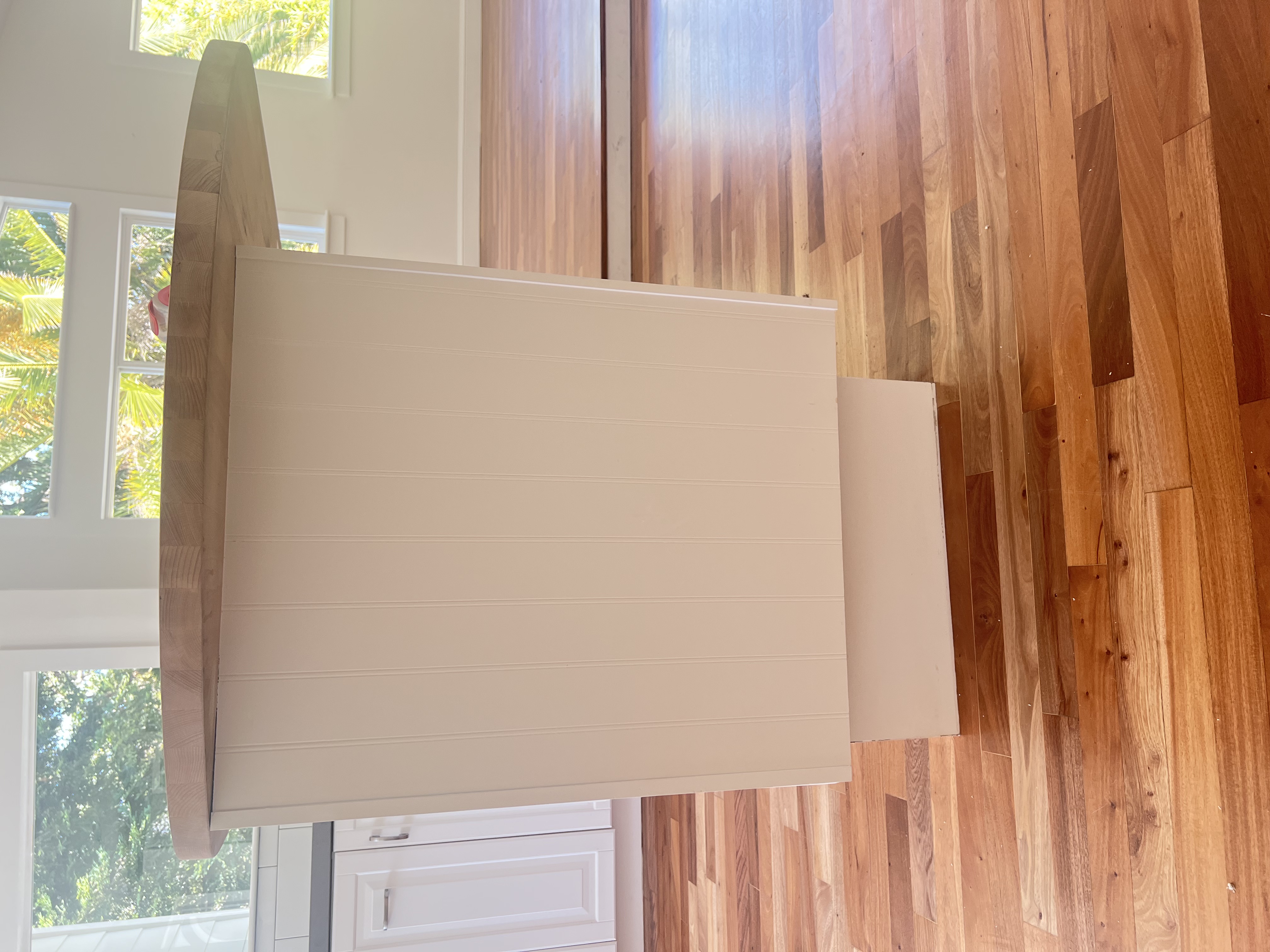 Handyman installing fixtures in a modern home